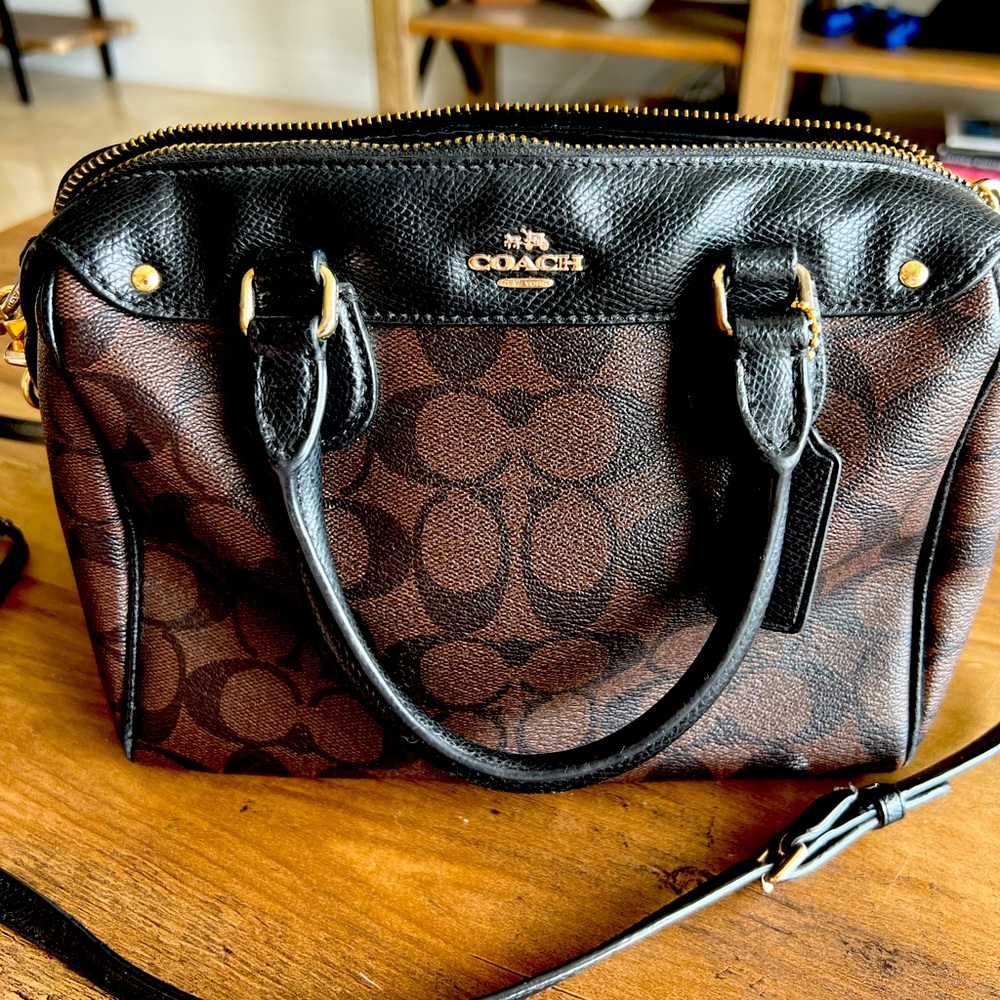 Black and brown Coach bag